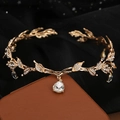 Golden bridal leaf crown with sparkling rhinestones and a pear-shaped drop pendant - Gold