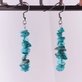 Handmade drop earrings featuring irregular blue-green turquoise stones with silver hooks - Turquoise