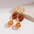 Detail of vintage long earrings with amber beads and irregular gold metal plates - S925 Silver Needle Earrings / Brown