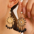 Bohemian gold hollow sunflower earrings with black bead tassels and crystal accents - KC Gold A-1231
