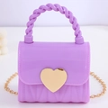 Lila Mini-Gelee-Handtasche mit goldener Herzschnalle und gedrehtem Griff für Damen - Violett