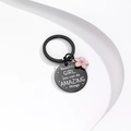 Portachiavi in acciaio inossidabile con fiore rosa e citazione motivazionale per donne - Nero
