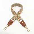 Detail of adjustable woven purse strap with beige jacquard pattern and brown leather ends - No.1 Green Brown Jacquard + Brown Leather