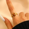Macro detail of a vintage gold ring featuring a brown tiger eye stone and embossed band - 椭圆浮雕线条款式(4392) / 18K Gold