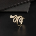 Close-up of gold-plated snake ring with white zircons and green gemstone eyes - Gold Snake Pavé White Zircon Ring