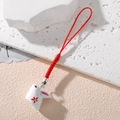 Cute ceramic rabbit phone charm with red braided strap and floral pattern pendant - Red Flower Rabbit