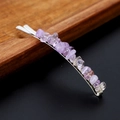 Close-up of silver hair clip decorated with natural purple amethyst crystal stones - Ametrine with Silver Clip