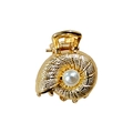 Detailed close-up of golden shell-shaped hair claw clip with a centered white pearl - Conch