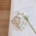 Detail view of quilted cotton mini tote with yellow tulip pattern and soft texture - Yellow Tulip