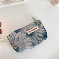 Close-up of jacquard woven pouch featuring vintage blue and white sunflower patterns - Oil Painting Chrysanthemum