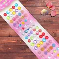 Macro shot of colorful resin gem stickers in heart, star and shell shapes for DIY decor - Shell Series Multi-color