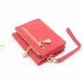 Detail view of red PU leather wallet with gold double zippers and a detachable wristlet - Red (Frosted)