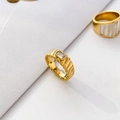 Macro view of gold textured ring band with rectangular clear crystal inlay detail - US 6 / Square White Zircon