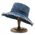 Vintage blue denim bucket hat with frayed edges and washed finish on wooden stand - One Size / Blue 2