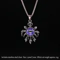 Collana gotica occhio del diavolo con teschio in acciaio inossidabile e gemma viola - Mano di Teschio Malocchio Viola