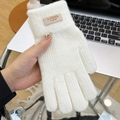 Close-up of white knitted winter glove with a fashion patch and thick warm texture - Open Finger Candy Color White