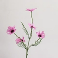 Detailed close-up of a pink artificial daisy flower with green stem against white background - Purple