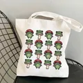 White frog and mushroom canvas tote bag with forest cartoon illustration on a metal chair - C1-Frog Mushroom (No Zipper No Pocket)