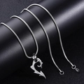 Close-up of silver snake chain necklace with tribal heart pendant and zircon stone detail - Silver Magatama Pendant (Snake Chain)