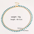 Detail van vergulde ketting gewicht 16g en blauwe zirkoon druppel hanger afmeting 3x6mm - Aquamarijn