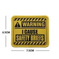Tactical WARNING embroidery patch with yellow and black safety message on white background - Warning I Cause Safety Briefs