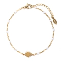 Detail of gold stainless steel sun pendant bracelet with white beads and lobster clasp - White