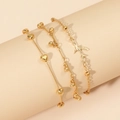 Three-piece golden zircon bracelet set with heart beads and airplane charm detail - KC Gold Airplane Heart Style (S59)