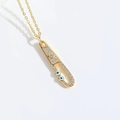 Vintage gold evil eye necklace featuring a diamond-encrusted safety pin pendant design - Blue Small Eyes