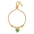 Adjustable gold bolo bracelet featuring a green malachite-style heart charm with sunburst edge - Gold Green Striped Bracelet (E465)