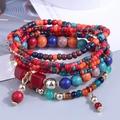Multilayer Bohemian beaded bracelet set with vibrant red, blue, and orange stones - Multicolor Multilayer