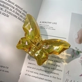 Translucent yellow butterfly hair claw clip made of resin with geometric facets - Phantom Yellow