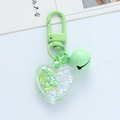 Light green heart keychain with shimmering sequins, lobster clasp and a small bell charm - 2.5cm Green
