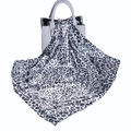 Grey and black leopard print satin head scarf draped over a grey handbag handle - Grey White Leopard