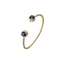 Detailed shot of golden open bangle featuring blue stones with pavé crystal accents - Double Blue Gemstones