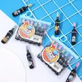 Mini pill-shaped 6-color highlighter set with space astronaut theme and blue zipper pouch - Wine Bottle