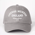 Close-up of white CHEESE MUFFIN embroidery on gray cotton twill baseball cap - One Size / Gray