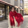 Thick red cashmere wool scarf with fringed edges worn by a model in a luxury street setting - Thickened Tassel Style (350g) / 200*70cm / Wine Red