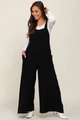 Detalle de peto premamá negro de pierna ancha con bolsillos delanteros y tirantes - S / Negro