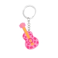 Cute pink cow print guitar keychain in soft silicone with silver metal ring - Pink Guitar