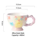 Hand-painted 400ml ceramic mug with floral relief patterns and a twisted handle - Grain Design