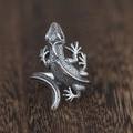 Retro S925 sterling silver lizard ring with red gemstone eyes on dark wood surface - Adjustable Open / Lizard / Antique Silver