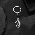 Polished silver stainless steel keychain featuring a stylish artistic letter T pendant - Letter F
