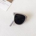 Foldable children's sunglasses in matte grey with dark black lenses and metal hinges - Gray