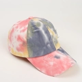 Close-up of colorful tie-dye baseball cap featuring vintage distressed ripped details - Orange