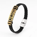 Detail of black woven leather bracelet with gold Jesus plate and silver buckle - JESUS Letter