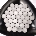 Polished transparent clear quartz crystal balls set in a triangular black stone tray - 25mm No Hole Sphere / White Crystal