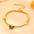 Detail of gold layered butterfly bracelet with black shell pendant and flat snake chain - Gold Black Shell Butterfly Bracelet (O505)