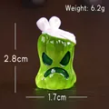 Grüne Mini-Kürbisfigur aus Harz mit weißer Schleife, 2,8 cm Halloween-Dekoration - Grüner Bandage-Geist