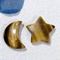Macro detail of polished tiger's eye crystal carved moon and star home decor accents - Star and Moon / Tiger's Eye