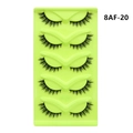 Macro detail of 5 pairs of cat-eye false eyelashes with natural density on green tray - Thickened Tail Style (8AF-20)